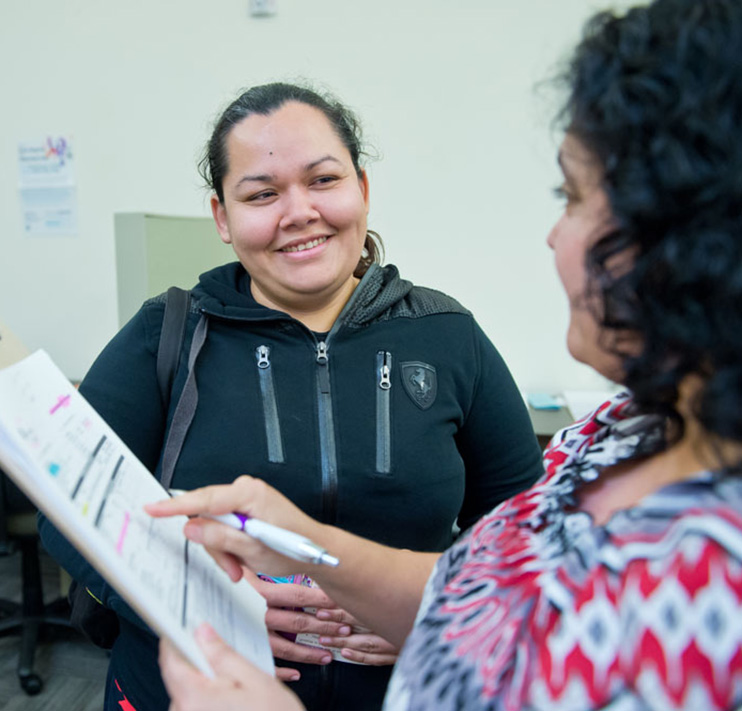 Jar with financial goals list.