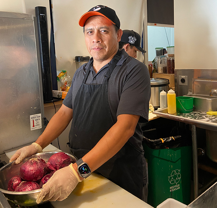 Entrepreneur by a kitchen.