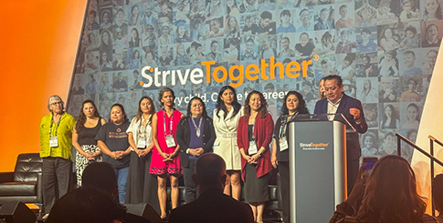 MEDA staff receiving Nancy Zimpher Courage in Leadership Award from StriveTogether in 2025.