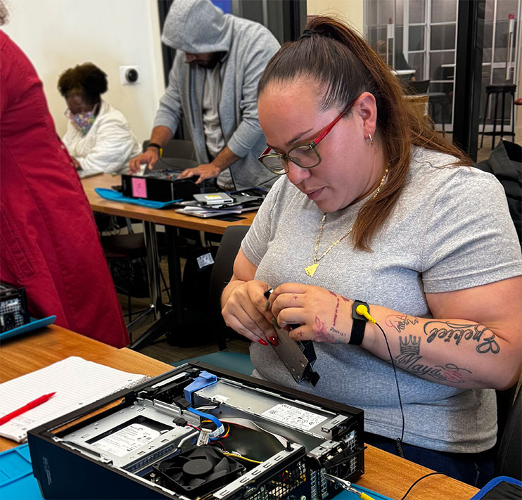 Woman at IT training class at MEDA.